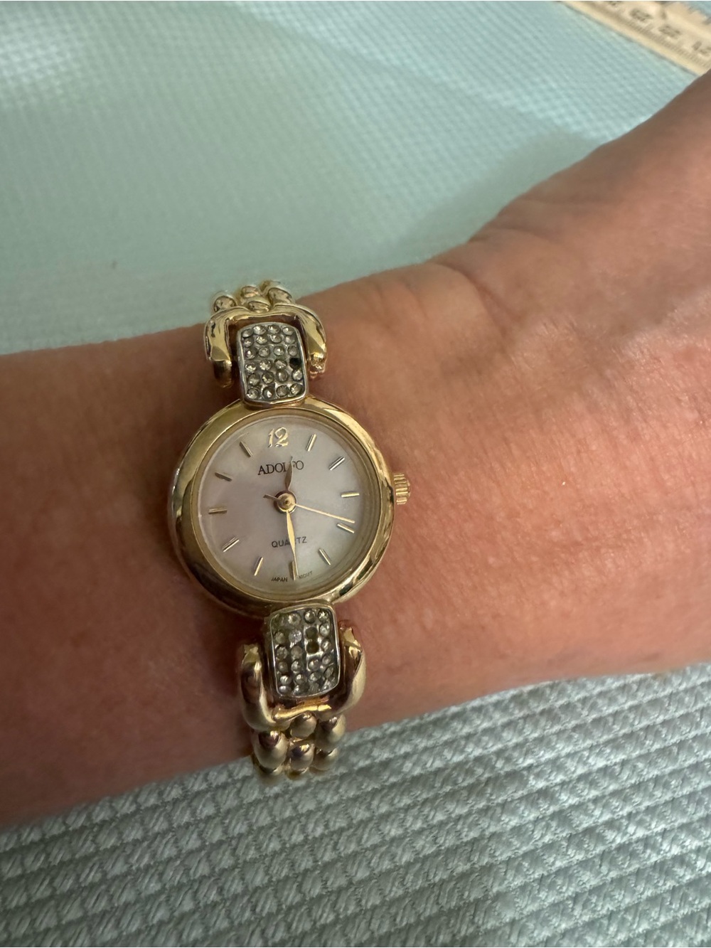 Adolfo Gold Tone Crystal Accent Women's Watch with Mother-of-Pearl Dial Works!